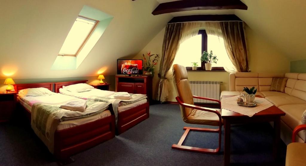 Postel nebo postele na pokoji v ubytování Hotel Spinaker