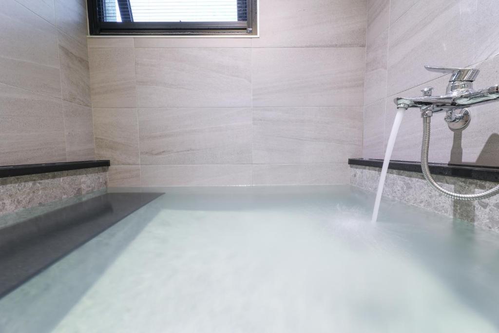 Fotografie z fotogalerie ubytování Green Hot Spring Hotel v destinaci Ťiao-si