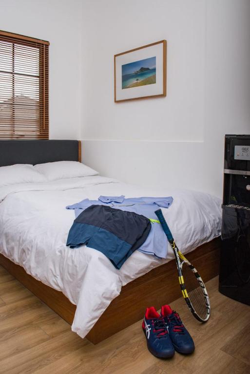 Postel nebo postele na pokoji v ubytování Rumanami Residence