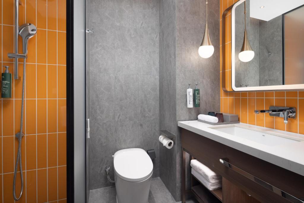 Koupelna v ubytování Home2 Suite by Hilton Harbin Central Street
