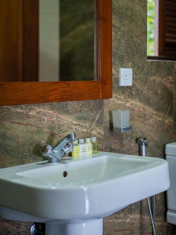 Koupelna v ubytování Abhayawewa Resort