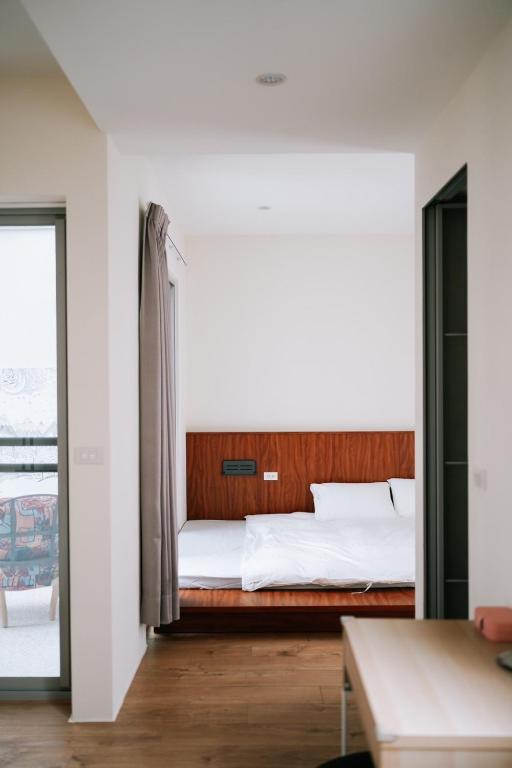 Uma cama ou camas num quarto em Danny's Home