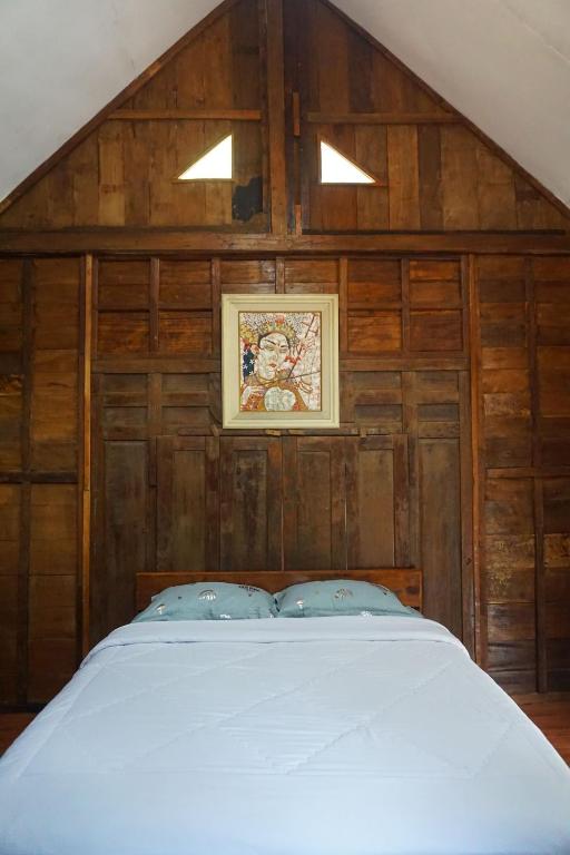 Postel nebo postele na pokoji v ubytování Le Desa Resort Syariah