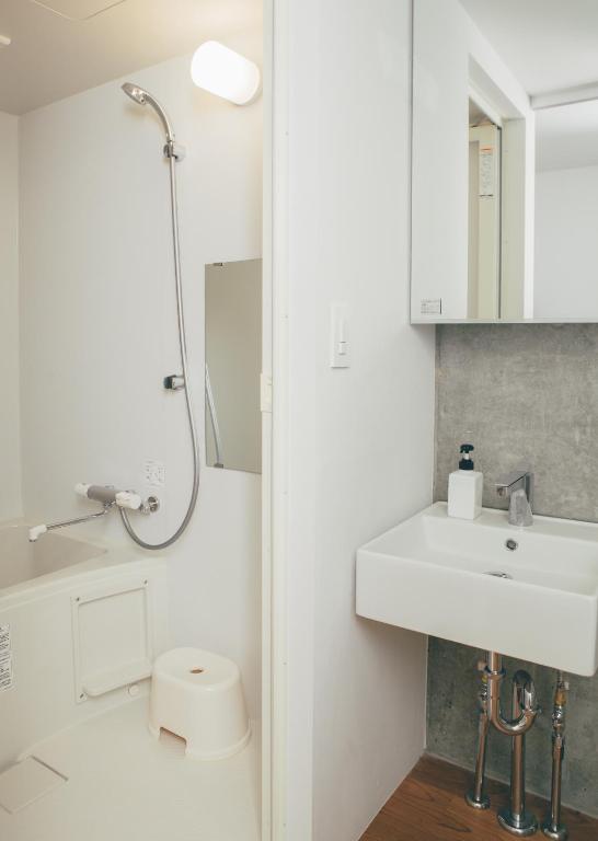Koupelna v ubytování DOMO Hotel