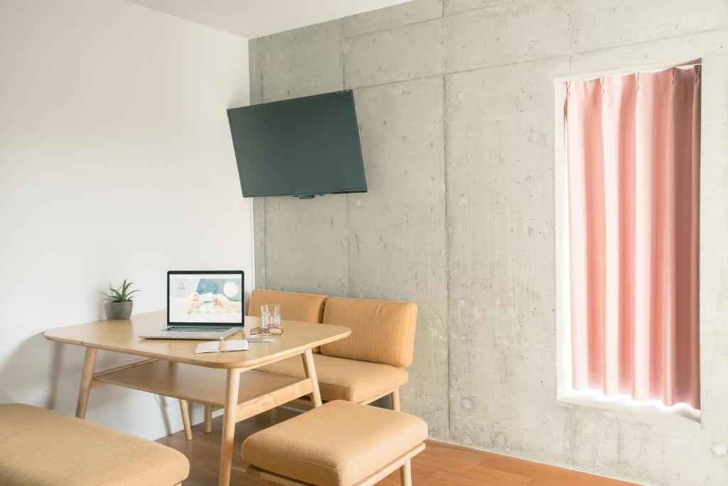 TV a/nebo společenská místnost v ubytování DOMO Hotel