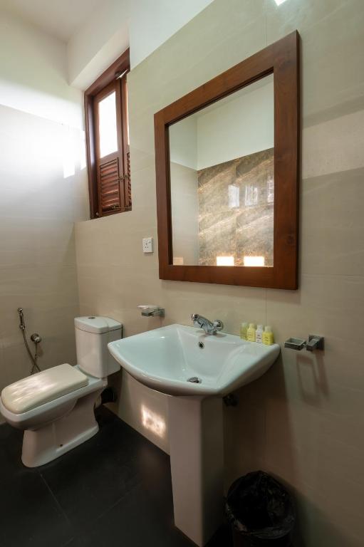 Koupelna v ubytování Abhayawewa Resort