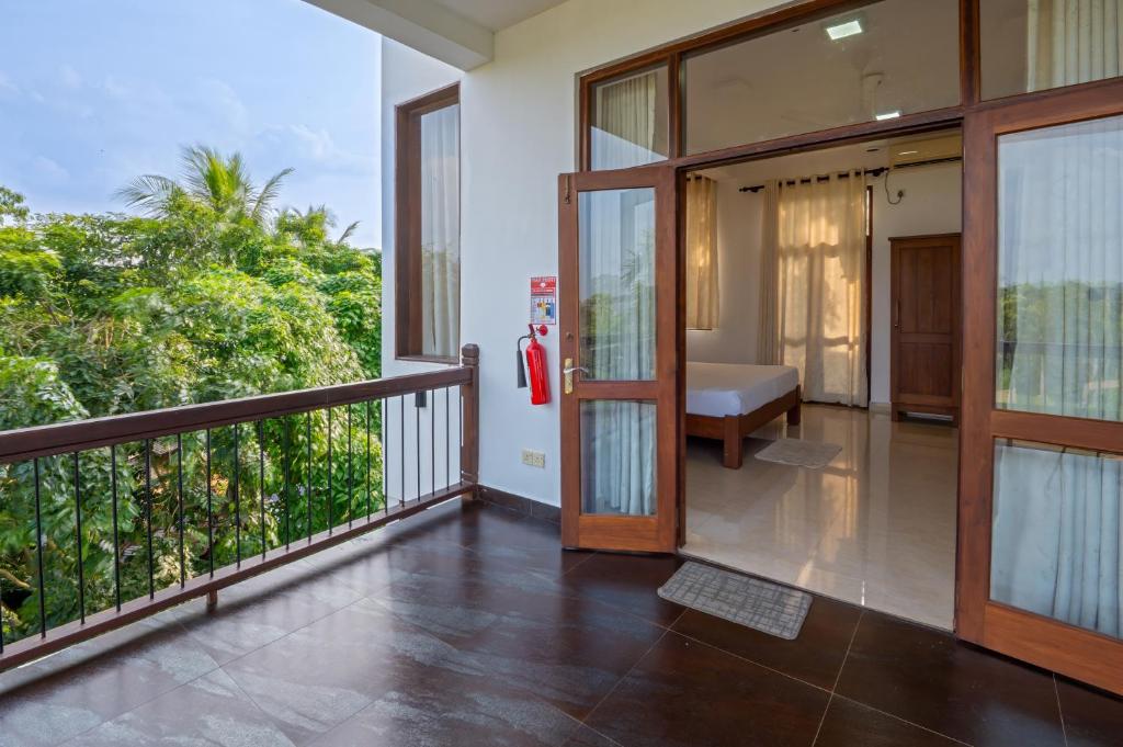 Postel nebo postele na pokoji v ubytování Abhayawewa Resort
