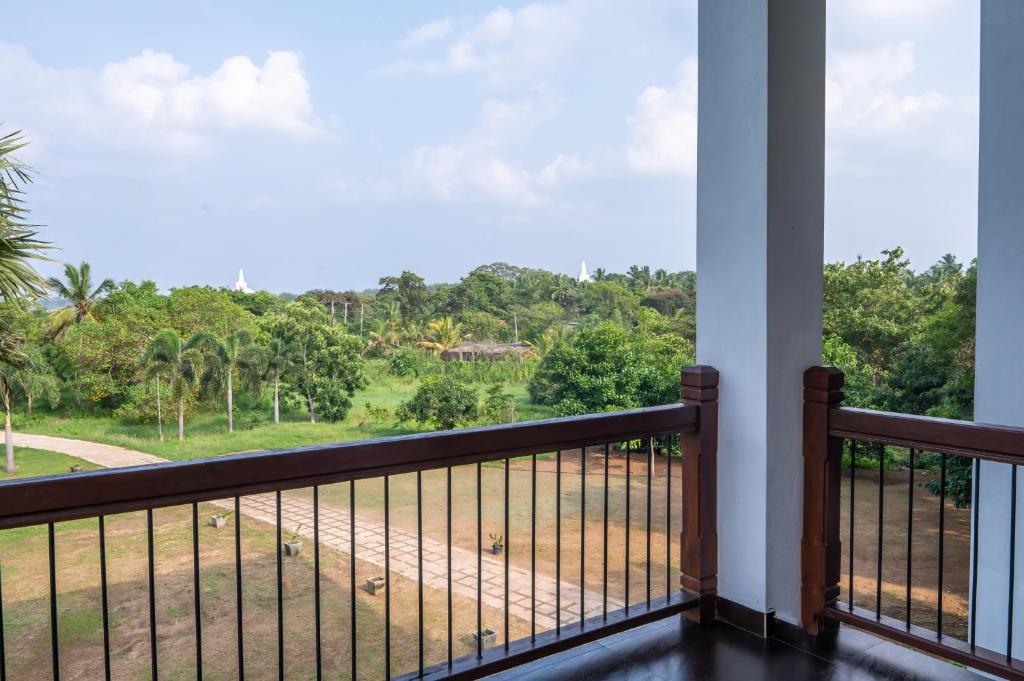 Balkón nebo terasa v ubytování Abhayawewa Resort