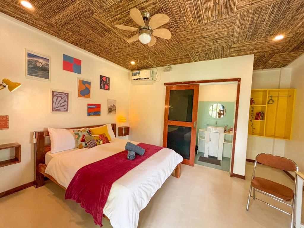 Postel nebo postele na pokoji v ubytování Copacabana Siargao