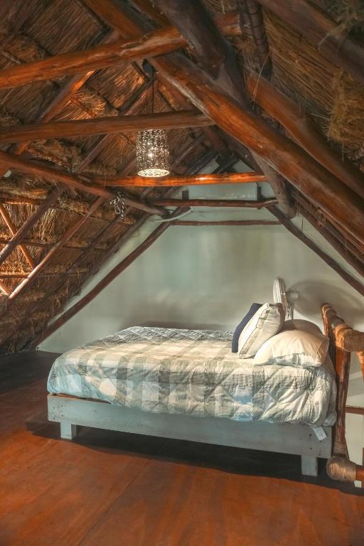 Postel nebo postele na pokoji v ubytování BAAWE Bacalar