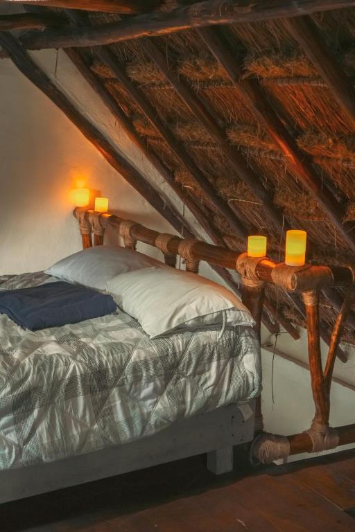 Postel nebo postele na pokoji v ubytování BAAWE Bacalar