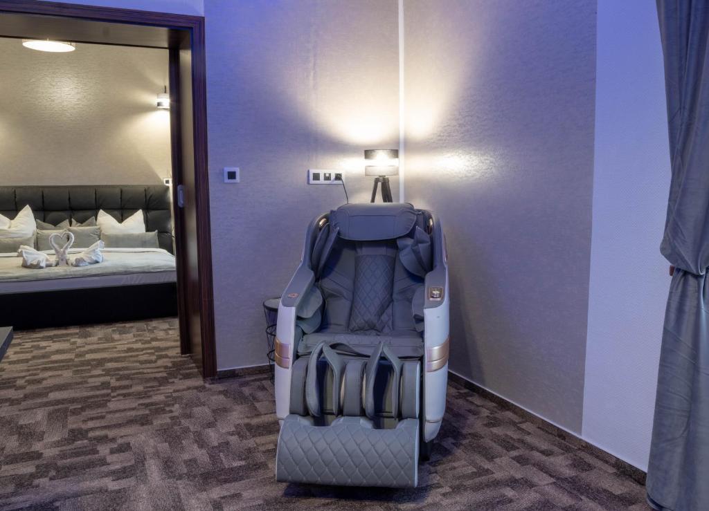 Łóżko lub łóżka w pokoju w obiekcie Wellness Hotel Beethoven