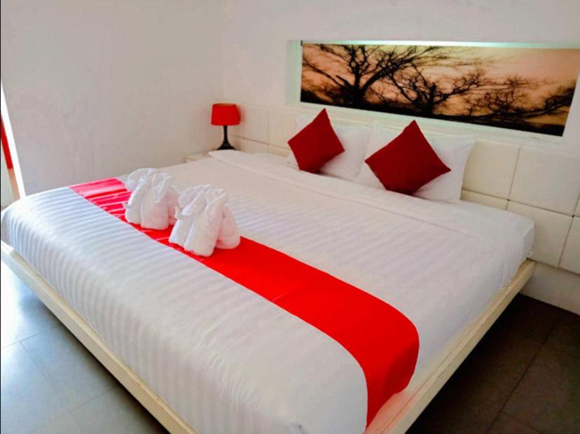 Postel nebo postele na pokoji v ubytování My Hotel Phuket