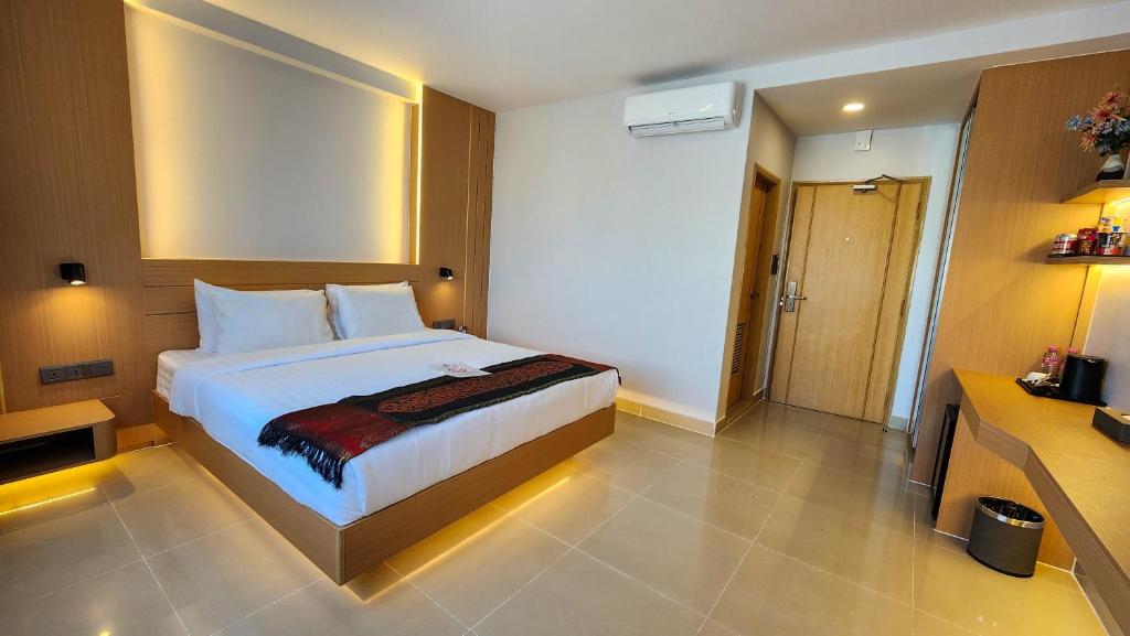 Postel nebo postele na pokoji v ubytování Silver Mounts Hotel