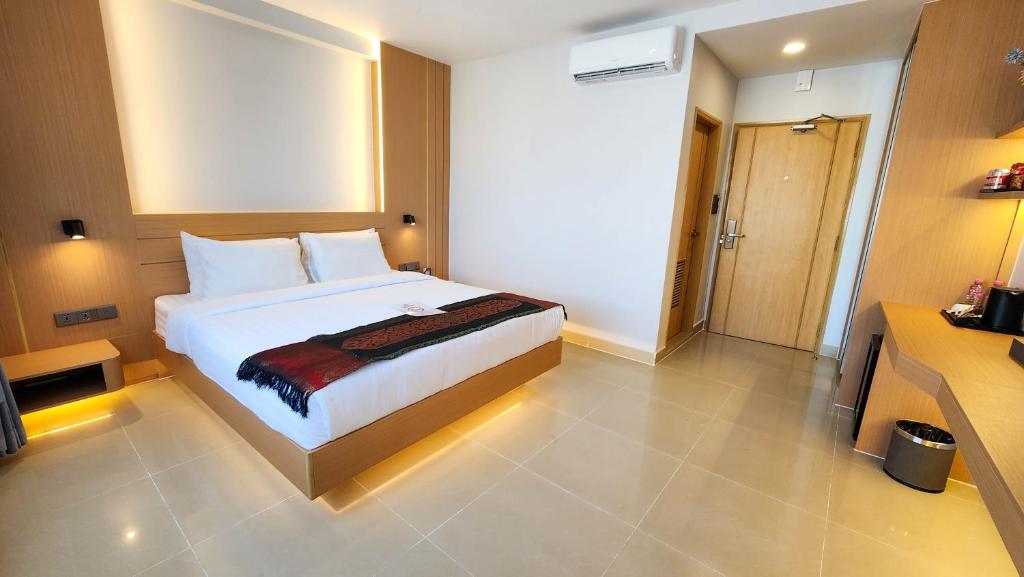 Postel nebo postele na pokoji v ubytování Silver Mounts Hotel
