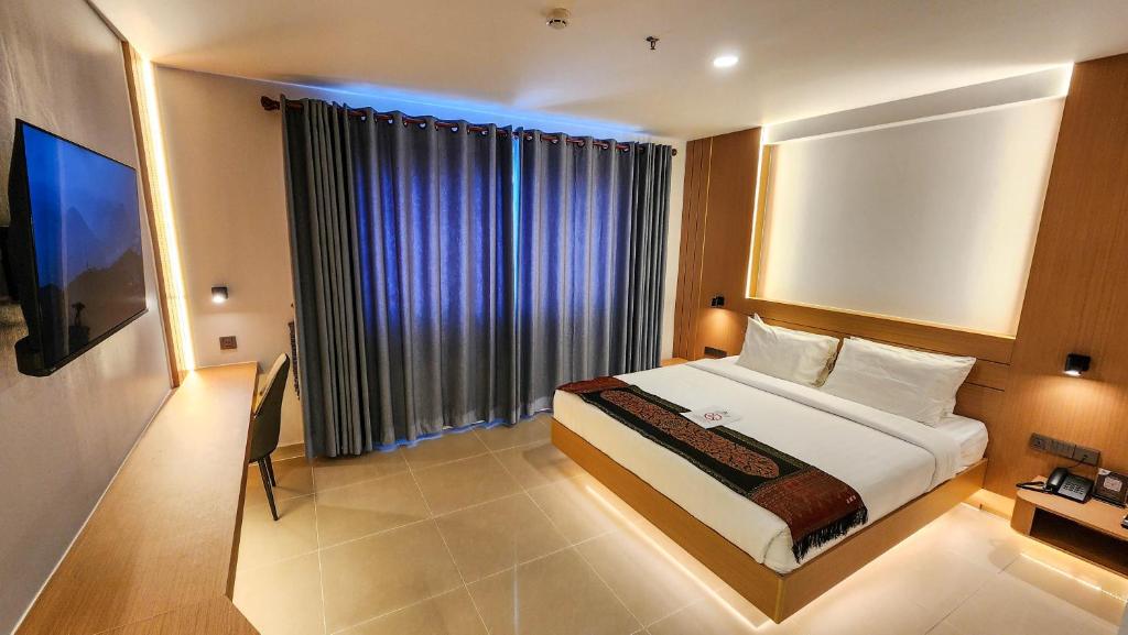Postel nebo postele na pokoji v ubytování Silver Mounts Hotel
