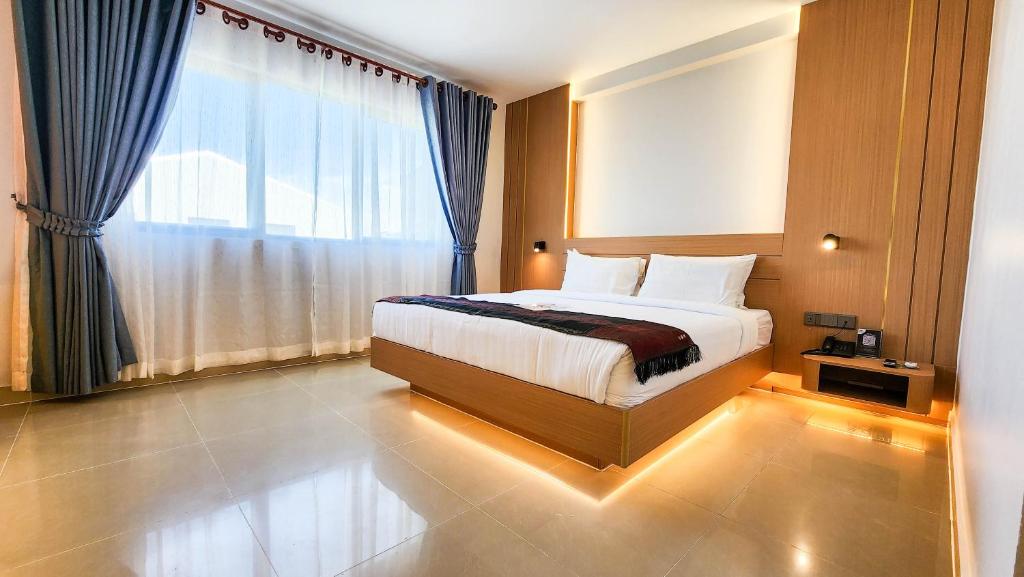 Postel nebo postele na pokoji v ubytování Silver Mounts Hotel