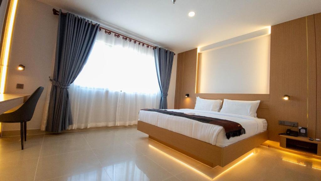 Postel nebo postele na pokoji v ubytování Silver Mounts Hotel