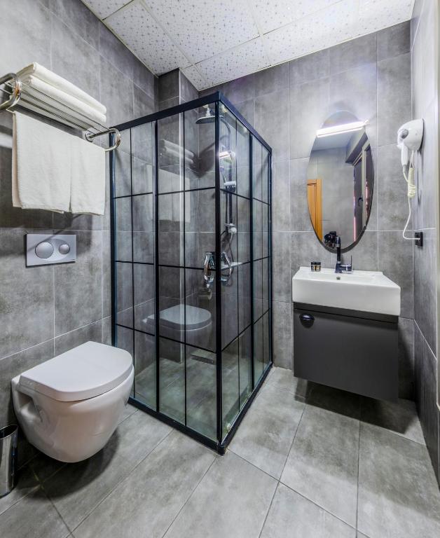 Koupelna v ubytování MED Airport Hotel