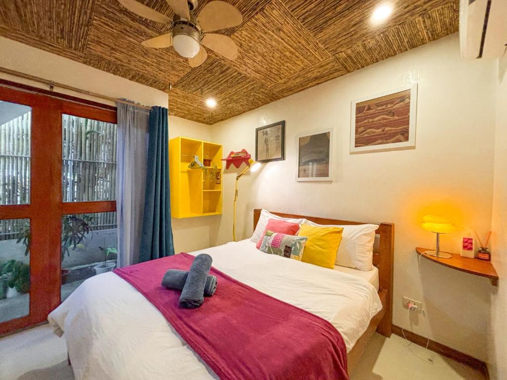Postel nebo postele na pokoji v ubytování Copacabana Siargao