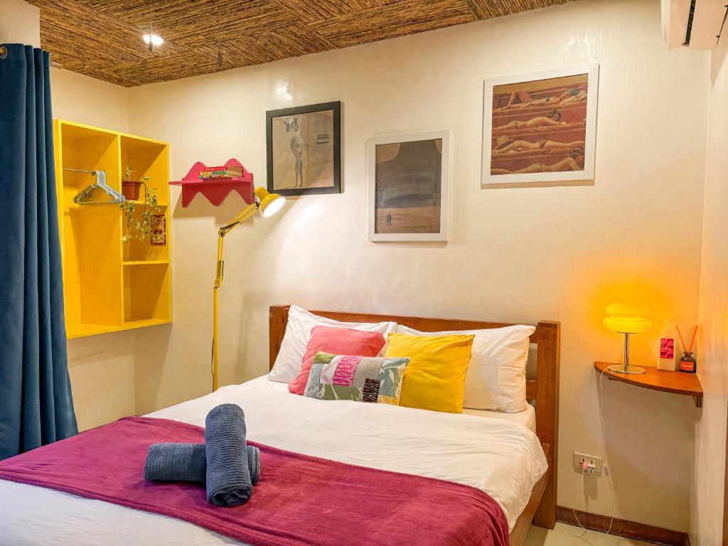 Postel nebo postele na pokoji v ubytování Copacabana Siargao