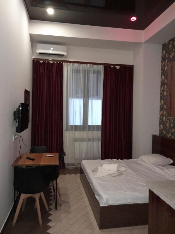 Postel nebo postele na pokoji v ubytování Amiryan by Armani hotels collection