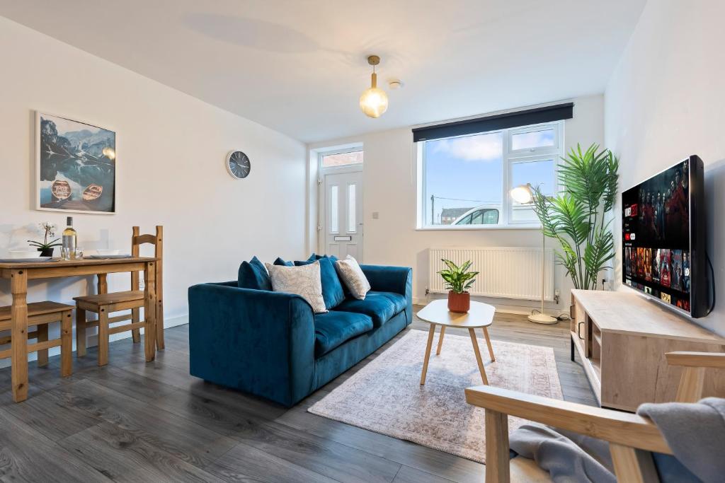 Et tv og/eller underholdning på Stylish Apartment - Free Wifi & Netflix - Parking - Pet Friendly 3MH