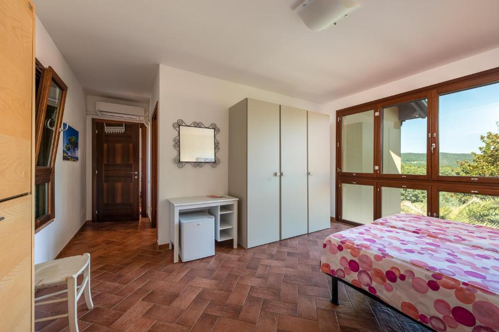 Postel nebo postele na pokoji v ubytování Massa Vecchia