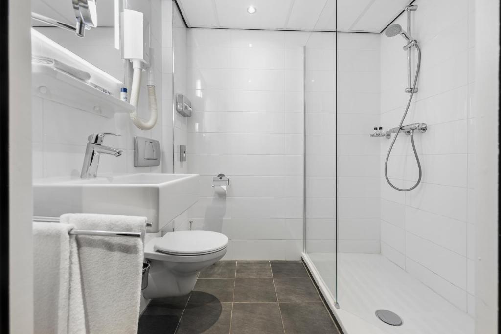 Een badkamer bij Hotel Die Port van Cleve