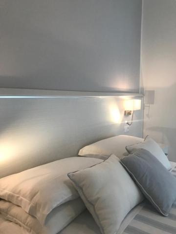 Postel nebo postele na pokoji v ubytování Hotel Plaza Esplanade