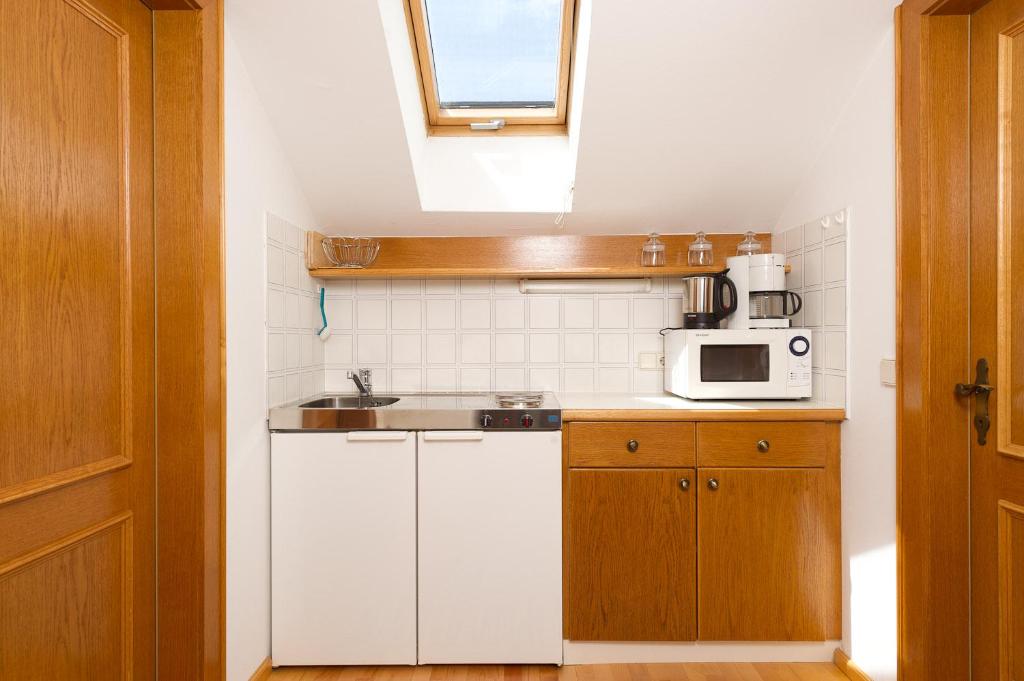 Kuchyň nebo kuchyňský kout v ubytování Landhaus Gailer