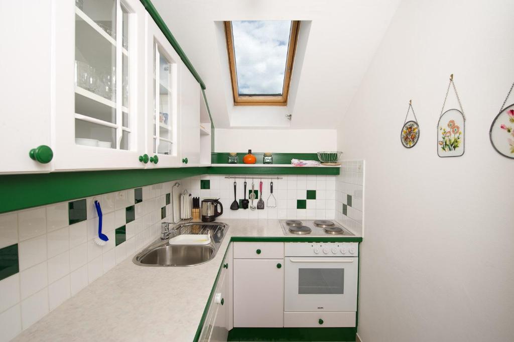 Kuchyň nebo kuchyňský kout v ubytování Landhaus Gailer