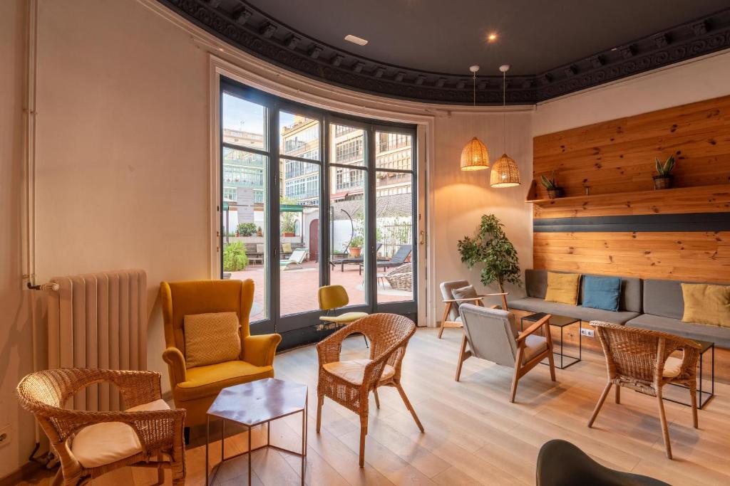 Uma área de estar em The Central House Barcelona Gracia