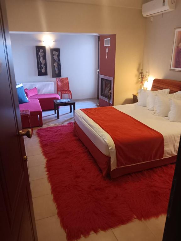 Postel nebo postele na pokoji v ubytování Pandion Luxury Boutique Hotel & Suites with Spa