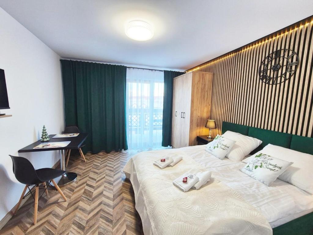 Posteľ alebo postele v izbe v ubytovaní Apartament 38 i 37 Okrzei 1c