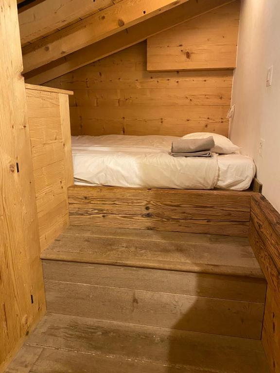 Postel nebo postele na pokoji v ubytování Verbier Valmont in center
