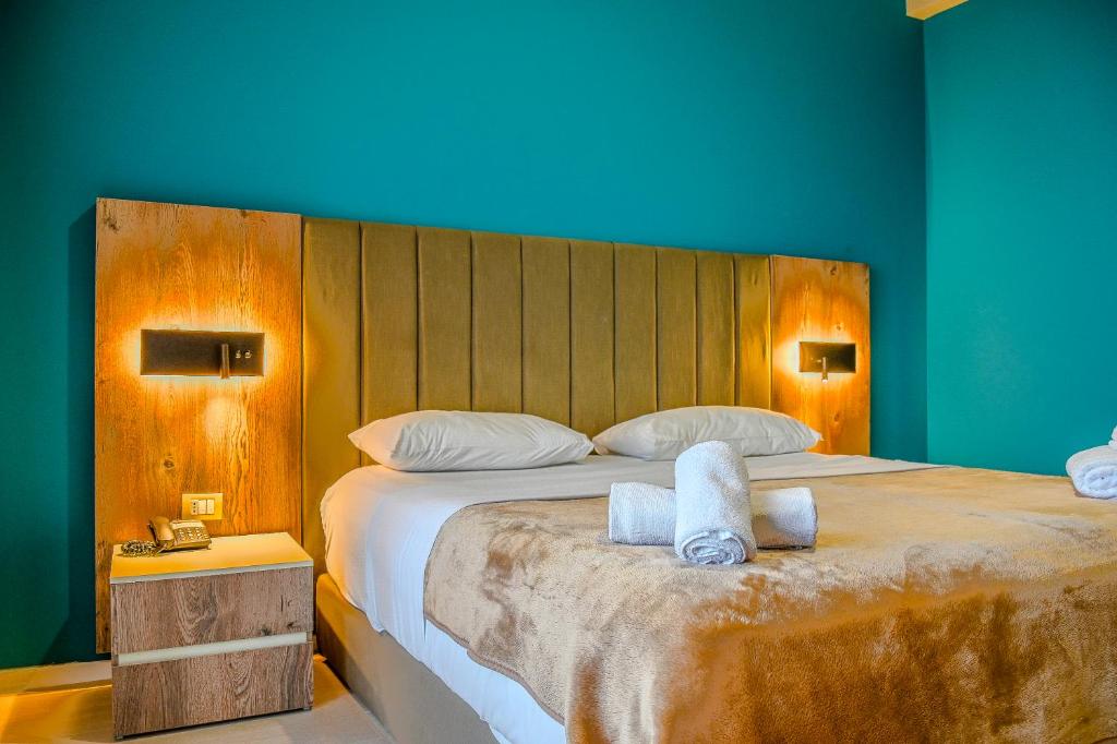 Rúm í herbergi á Hotel Vivas