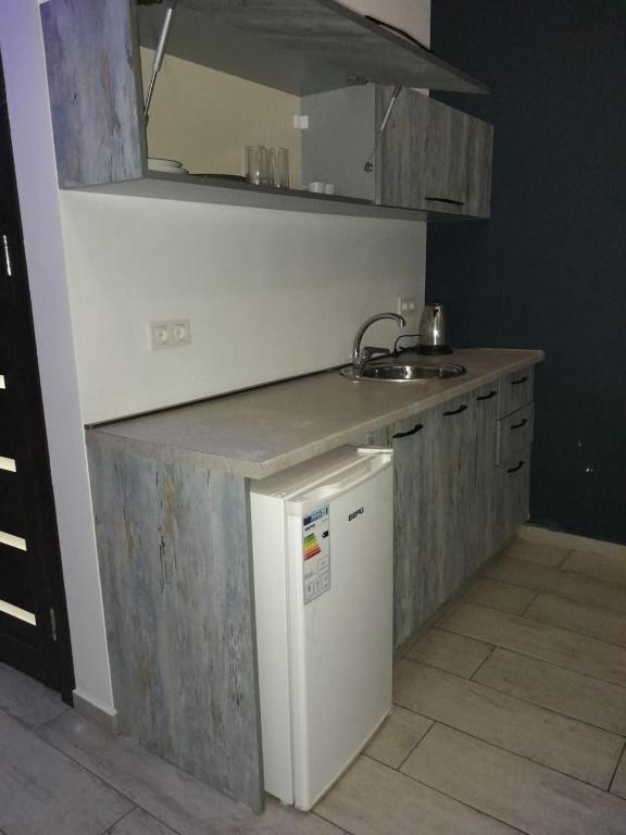 Kuchyň nebo kuchyňský kout v ubytování Amiryan by Armani hotels collection