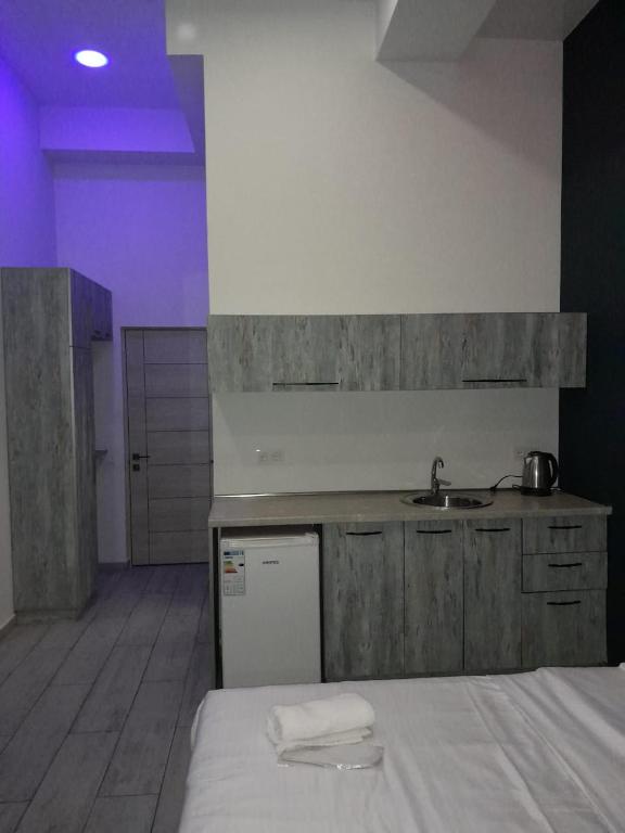 Kuchyň nebo kuchyňský kout v ubytování Amiryan by Armani hotels collection