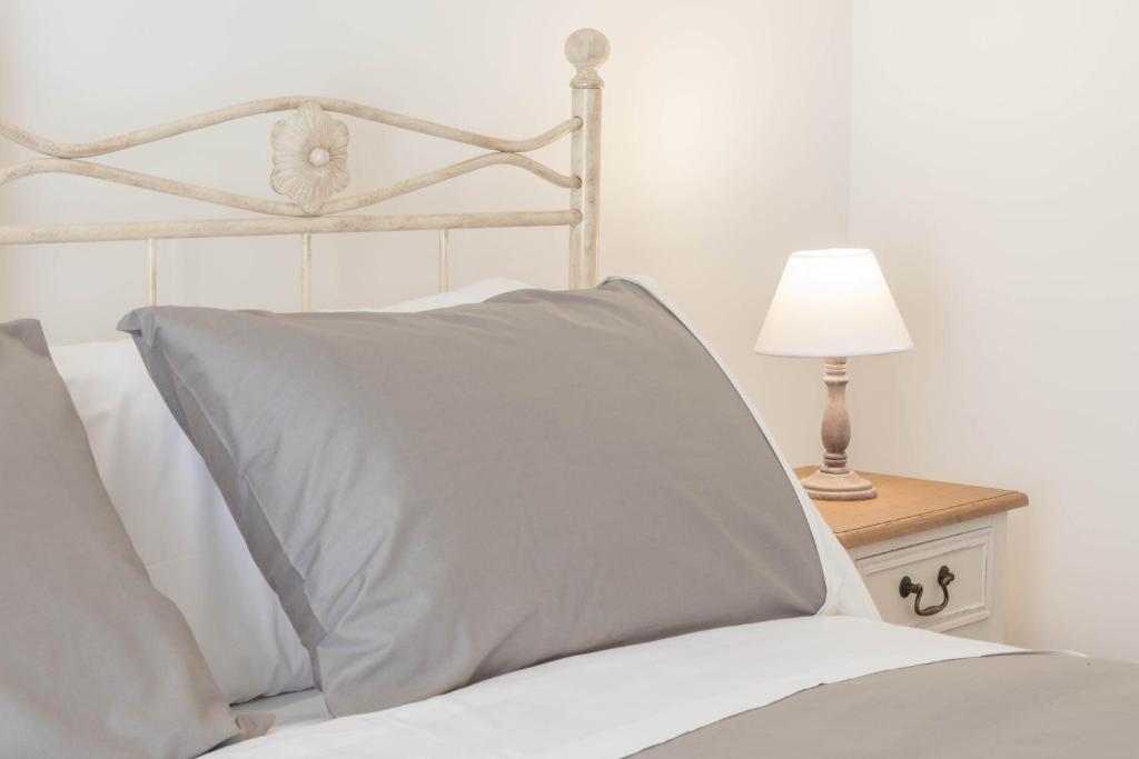 Posteľ alebo postele v izbe v ubytovaní Donna Margherita Rome Suite & Rooms