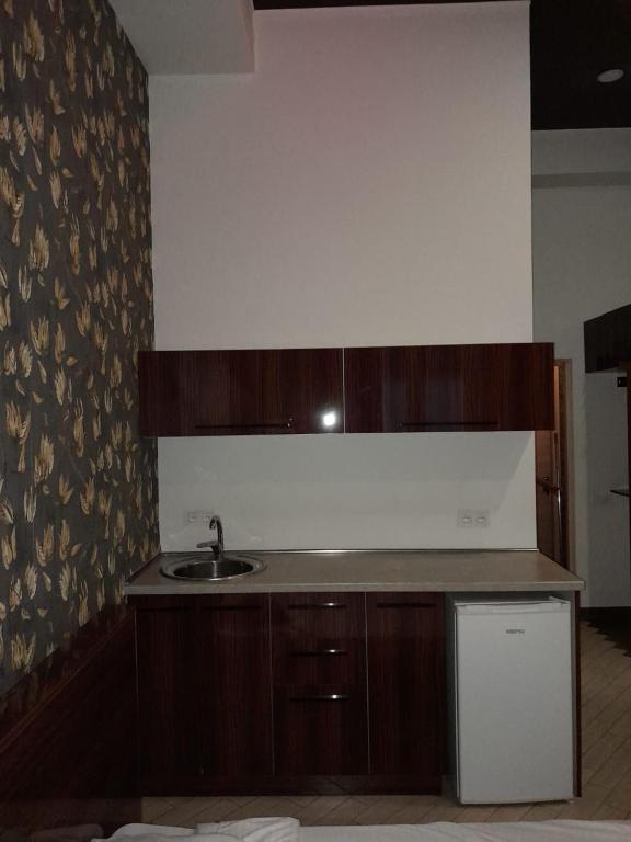Kuchyň nebo kuchyňský kout v ubytování Amiryan by Armani hotels collection