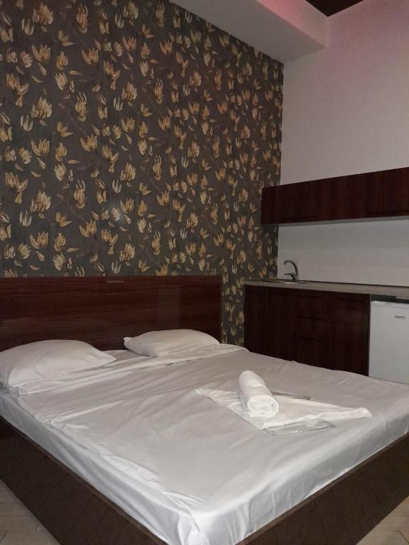 Postel nebo postele na pokoji v ubytování Amiryan by Armani hotels collection