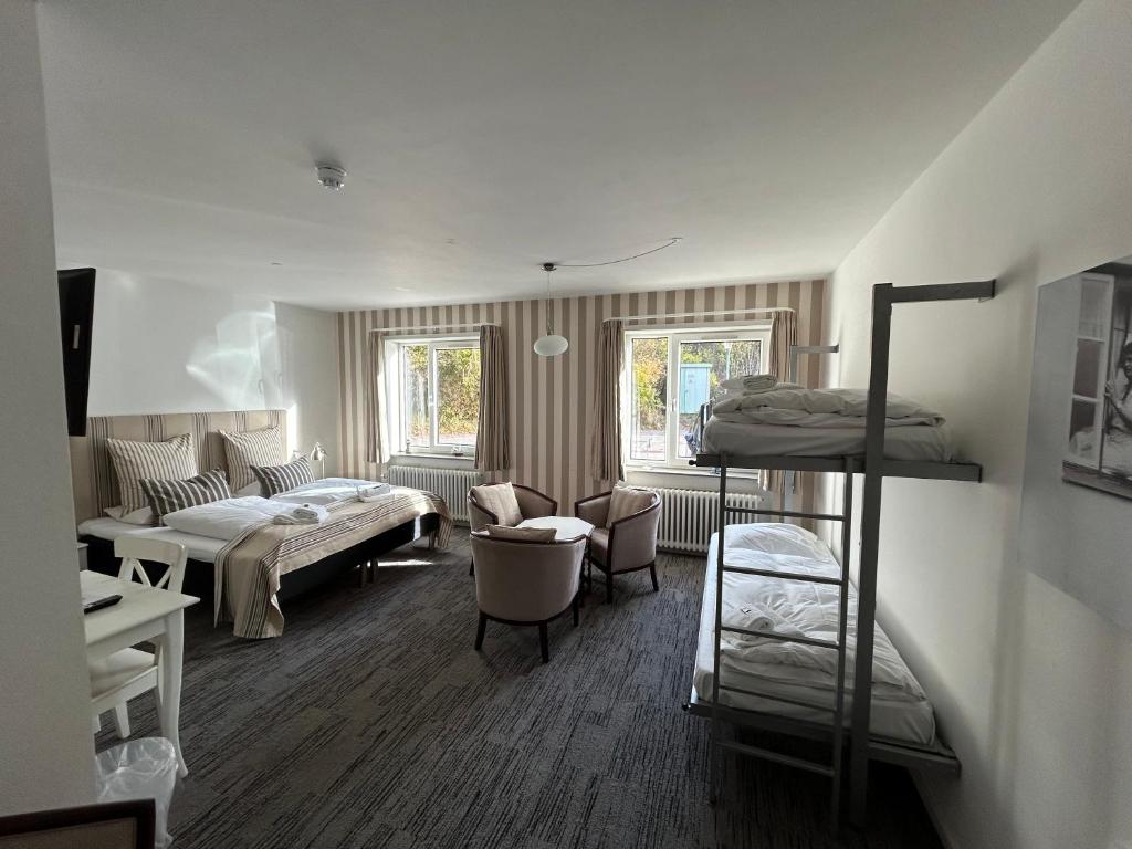 Postel nebo postele na pokoji v ubytování Hotel Højbysø