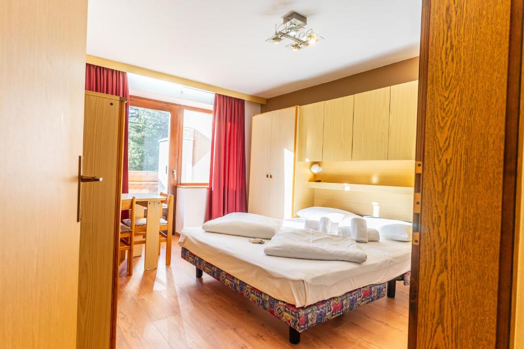 Postel nebo postele na pokoji v ubytování Camping Sass Dlacia