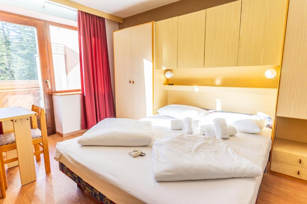 Postel nebo postele na pokoji v ubytování Camping Sass Dlacia