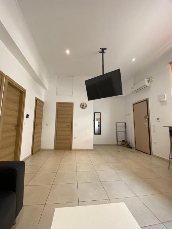 TV a/nebo společenská místnost v ubytování Sisifou Hostel
