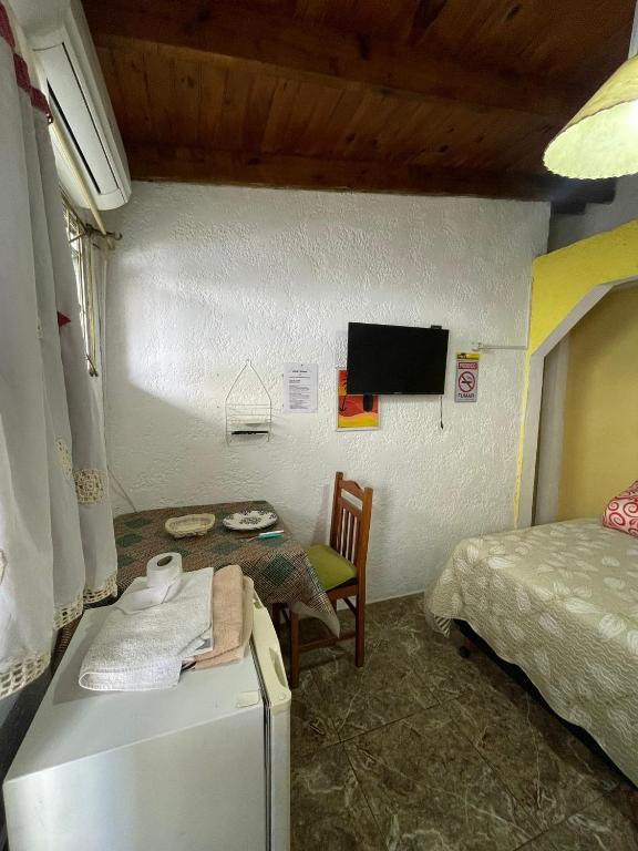 Postel nebo postele na pokoji v ubytování Alojamiento Lunas en Chuy con Baño Privado