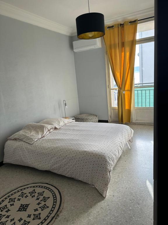 Posteľ alebo postele v izbe v ubytovaní Appartement t4 spacieux 100m2 climatisé