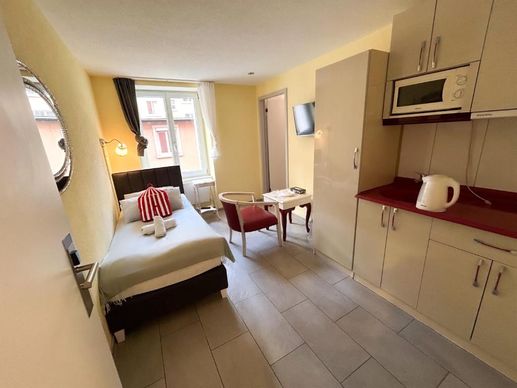 Kuchyň nebo kuchyňský kout v ubytování Gasthaus 210