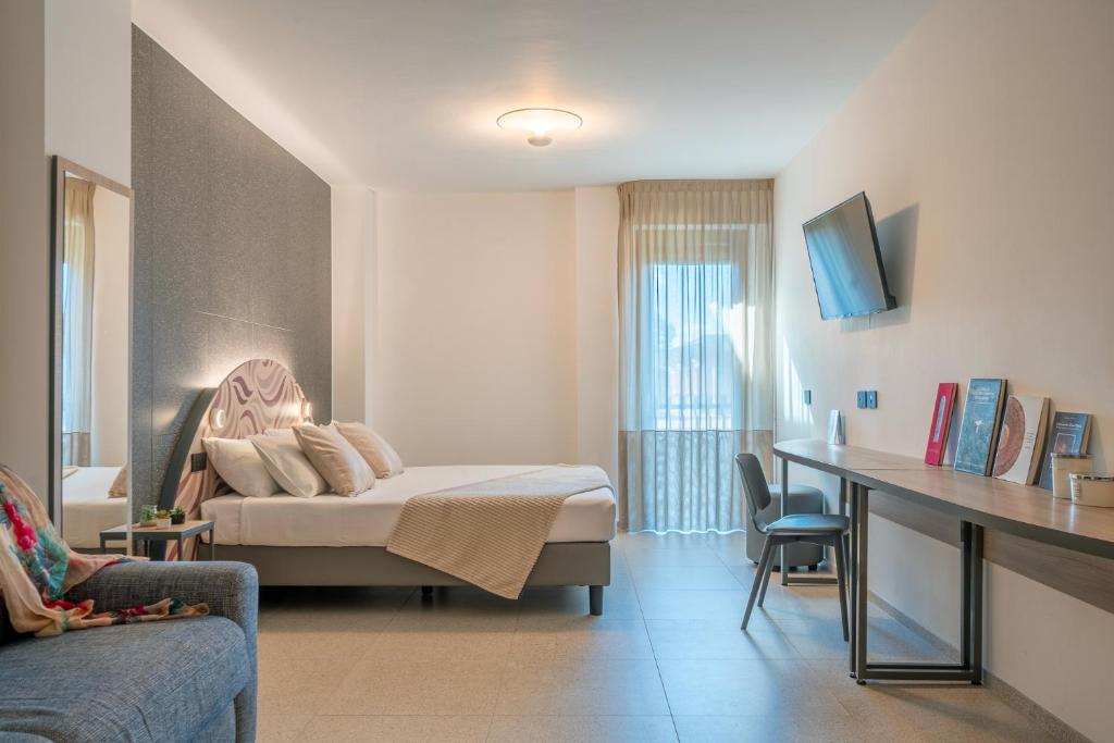 TV a/nebo společenská místnost v ubytování Hub Hotel